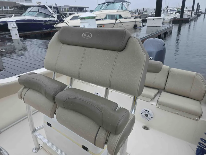 Slide: The Image of Key West 219 FS 2023 boat seats at the dock. - 12