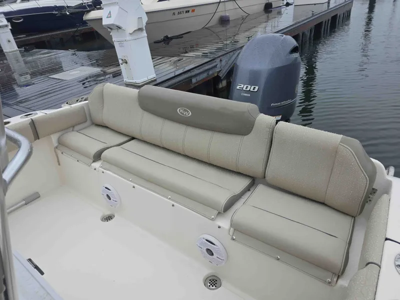 Slide: The Image of Key West 219 FS 2023 boat with Yamaha engine at dock. - 13