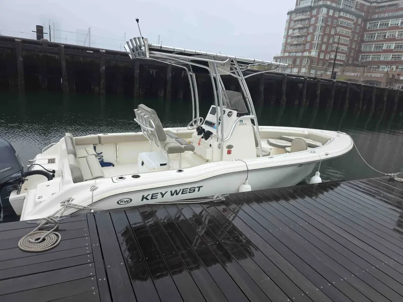 Slide: The Image of 2023 Key West 219 FS boat docked, modern design. - 4