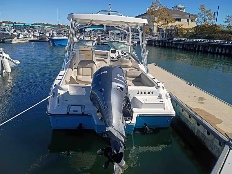 Slide: The Image of 2024 Key West 239 DFS boat docked at marina. - 3