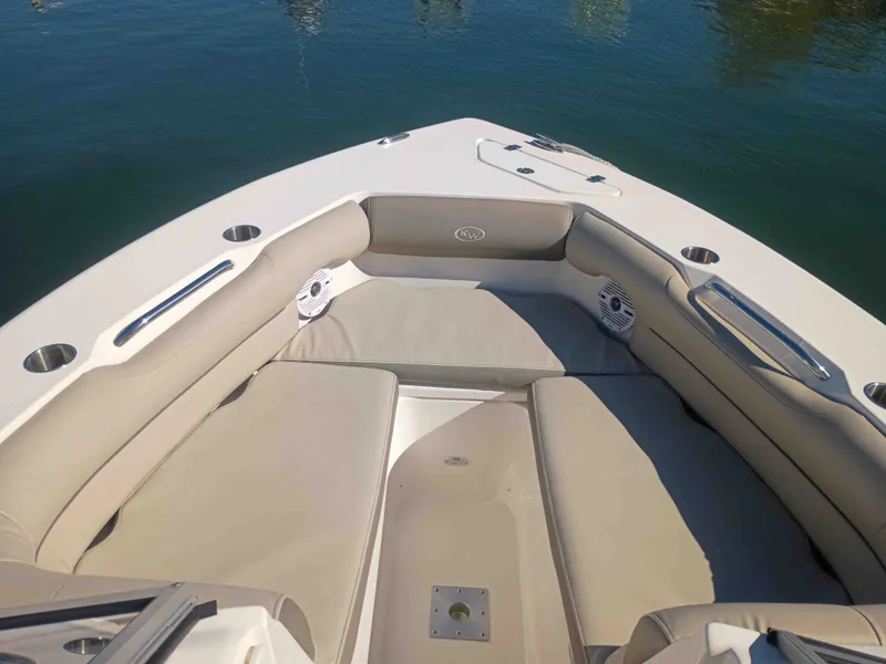 Slide: The Image of Interior view of 2024 Key West 239 DFS boat with beige upholstery. - 8