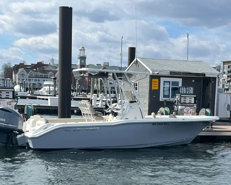The Image of 2024 Key West 239 FS boat docked under cloudy skies. - 0