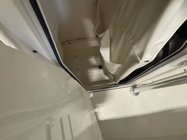 Slide: The Image of Interior of 2024 Key West 239 FS with curtain. - 15