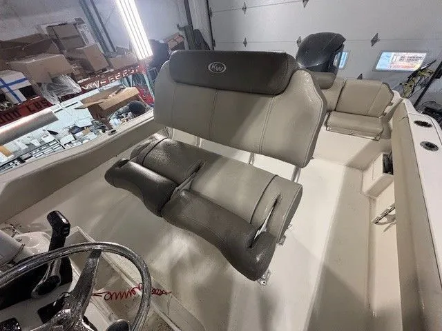 Slide: The Image of Interior of a 2024 Key West 239 FS boat with gray seating. - 19