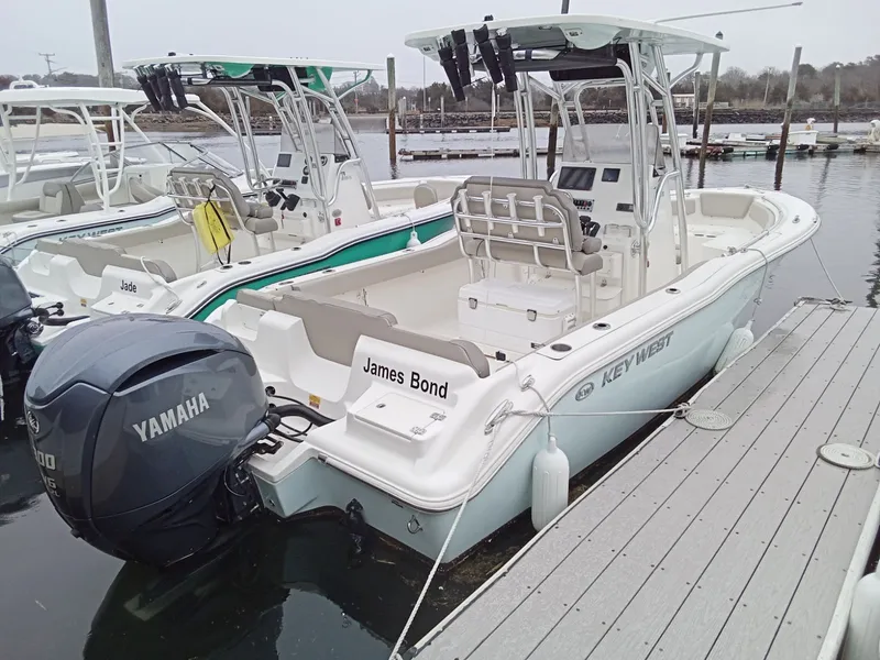 Slide: The Image of Key West 239 FS boat 2023 at dock with Yamaha engine. - 2