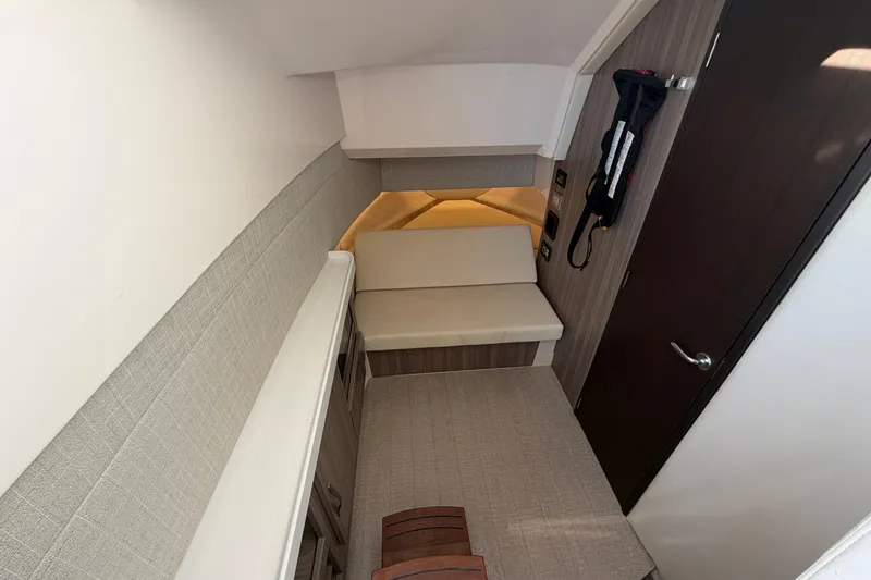 Slide: The Image of 2021 Regal 38 SAV cabin interior with seating and modern design elements. - 23