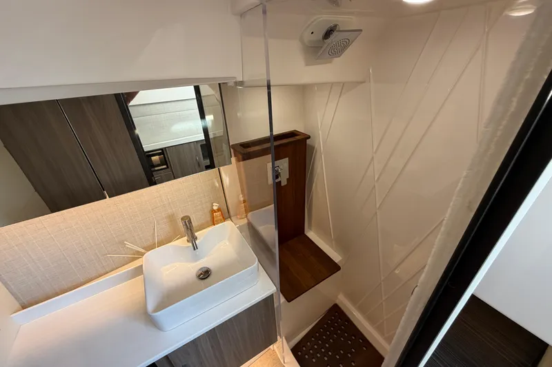 Slide: The Image of Modern bathroom interior of 2021 Regal 38 SAV yacht with sleek sink and shower. - 27