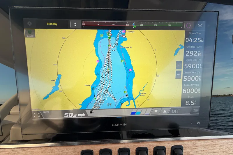 Slide: The Image of Garmin navigation display on 2021 Regal 38 SAV boat, showing speed and route. - 32