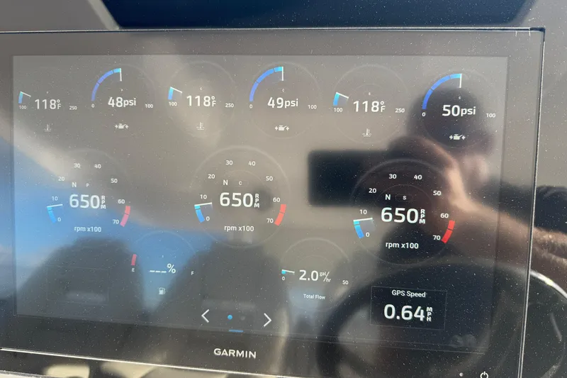 Slide: The Image of Garmin display on 2021 Regal 38 SAV showing engine metrics and GPS speed. - 35