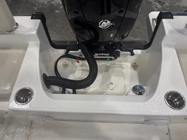 Slide: The Image of Boston Whaler 190 Montauk 2025 engine area with Seastar control. - 13