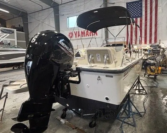Slide: The Image of 2025 Boston Whaler 190 Montauk in storage with Mercury engine. - 5