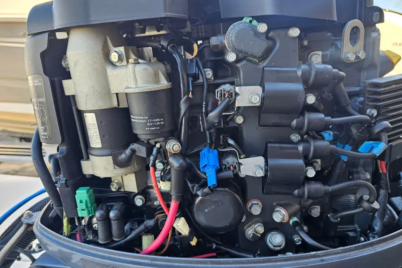 Slide: The Image of Close-up of a 2002 Maverick 17 HPX Mirage Tunnel boat engine components. - 10