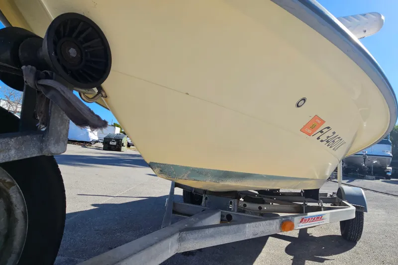 Slide: The Image of 2002 Maverick 17 HPX Mirage Tunnel boat on trailer, close-up view. - 13