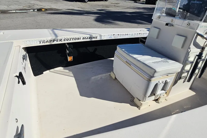 Slide: The Image of 2002 Maverick 17 HPX Mirage Tunnel boat interior with seating and storage. - 15