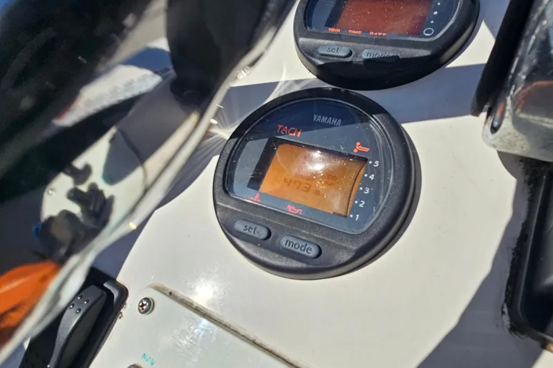Slide: The Image of Close-up of Yamaha tachometer on 2002 Maverick 17 HPX Mirage Tunnel boat dashboard. - 26