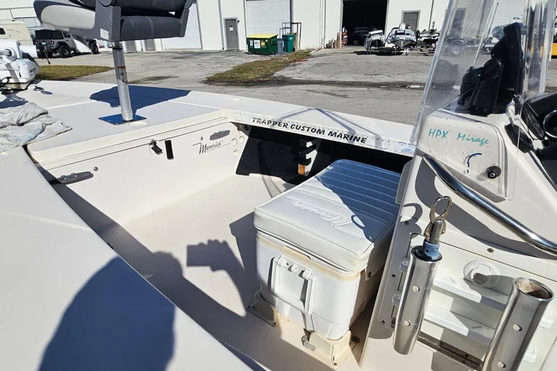 Slide: The Image of 2002 Maverick 17 HPX Mirage Tunnel boat interior with seating and console details. - 27