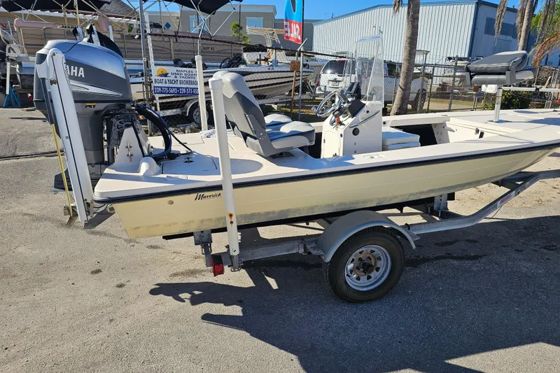 Slide: The Image of 2002 Maverick 17 HPX Mirage Tunnel boat on trailer with Yamaha outboard motor. - 3