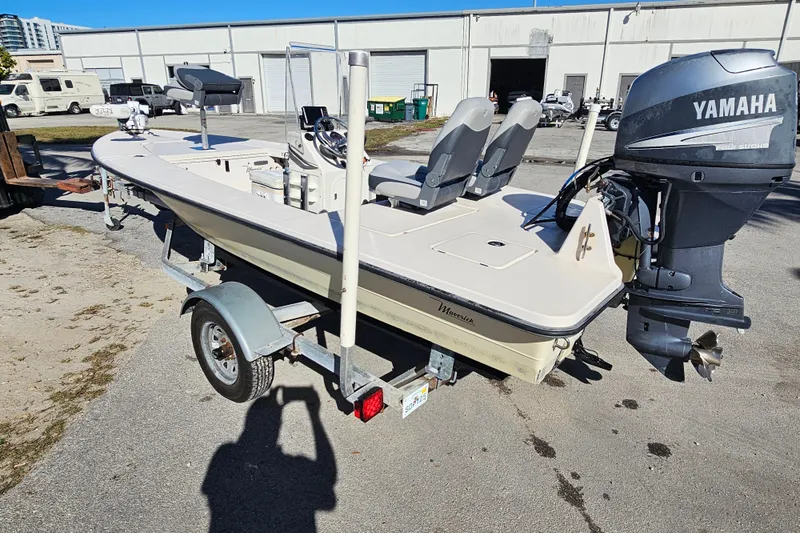 Slide: The Image of 2002 Maverick 17 HPX Mirage Tunnel boat on trailer with Yamaha outboard motor. - 8