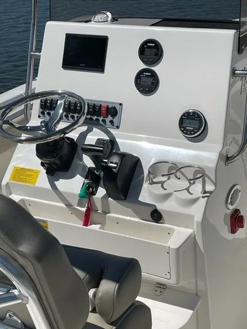 Slide: The Image of Helm console of a 2024 Key West 239 FS boat. - 2