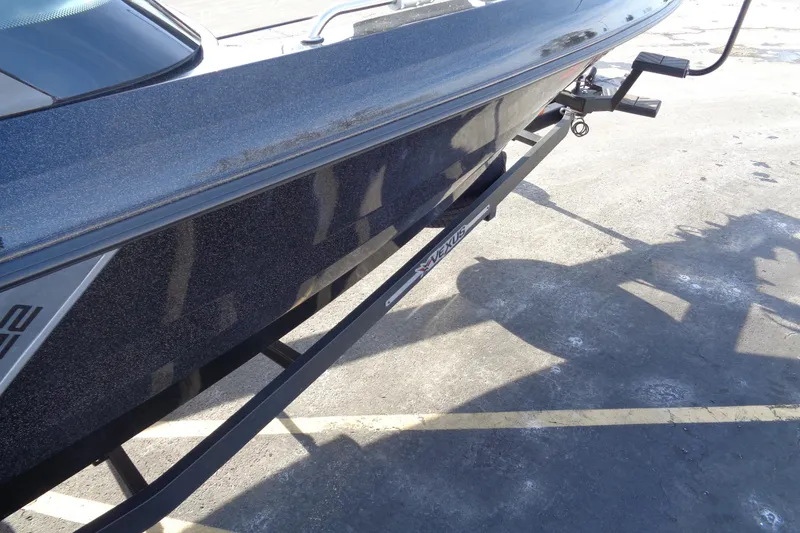 Slide: The Image of 2022 Vexus DVX22 boat on trailer, side view with metallic finish. - 17
