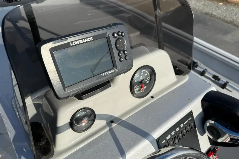Slide: The Image of 2022 G3 Gator Tough 17 CCJ DLX boat dashboard with Lowrance Hook2 fish finder. - 13