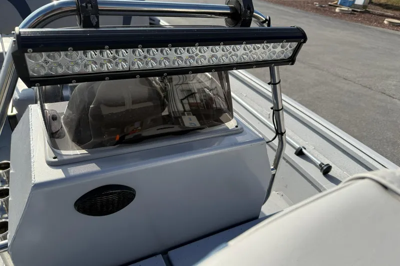 Slide: The Image of 2022 G3 Gator Tough 17 CCJ DLX boat console with LED light bar. - 16
