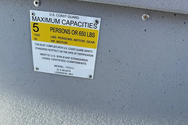Slide: The Image of 2022 G3 Gator Tough 17 CCJ DLX capacity label, 5 persons or 650 lbs, U.S. Coast Guard compliant. - 18