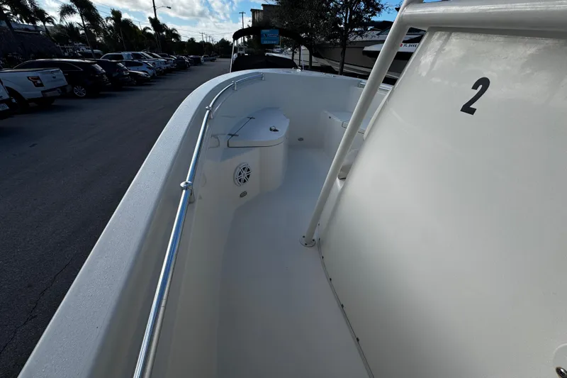 Slide: The Image of 2021 Cobia 220 Center Console boat interior with sleek design and spacious deck. - 11