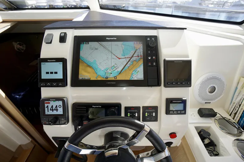 Slide: The Image of Control panel of 2020 Aquila 44 Yacht with navigation and monitoring systems. - 13