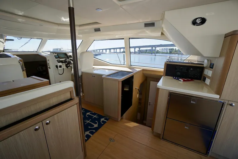 Slide: The Image of Luxurious interior of 2020 Aquila 44 Yacht with modern navigation and kitchen amenities. - 18