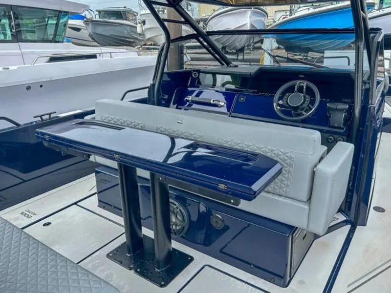 Slide: The Image of Interior of 2024 BRABUS Shadow 1000 ST luxury boat with sleek seating and modern dashboard. - 17
