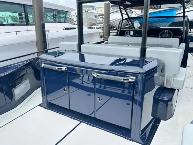 Slide: The Image of 2024 BRABUS Shadow 1000 ST luxury yacht interior with sleek blue cabinetry. - 22