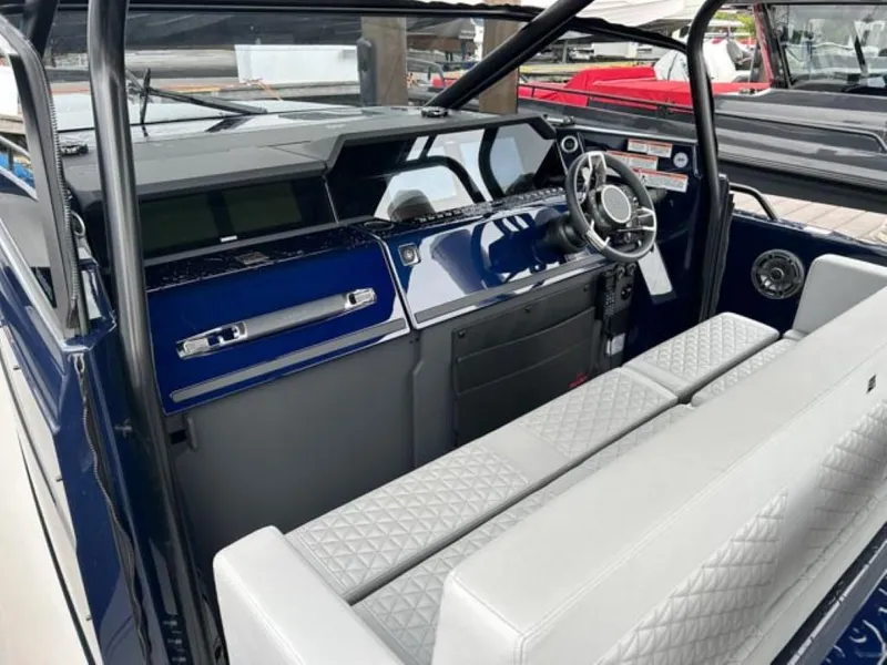 Slide: The Image of Interior of 2024 BRABUS Shadow 1000 ST luxury boat with modern dashboard and seating. - 28