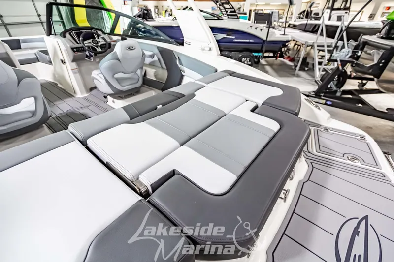 Slide: The Image of 2026 Chaparral 21 SSi boat interior with sleek seating and modern design at Lakeside Marina. - 12