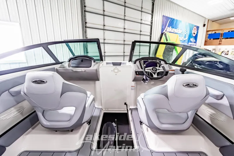 Slide: The Image of Interior of 2026 Chaparral 21 SSi boat with modern seating and dashboard. - 21