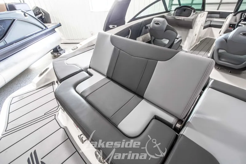 Slide: The Image of 2026 Chaparral 21 SSi boat interior with sleek seating and modern design. - 12