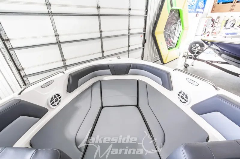 Slide: The Image of 2026 Chaparral 21 SSi boat interior with gray seating at Lakeside Marina. - 28