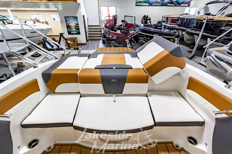 Slide: The Image of 2026 Chaparral 21 SSi boat interior with open storage compartments and seating. - 16