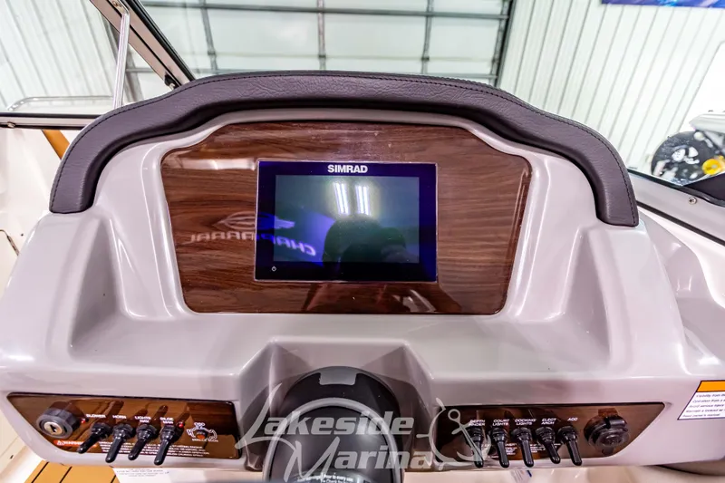 Slide: The Image of 2026 Chaparral 21 SSi boat interior with stylish seating at Lakeside Marina. - 19