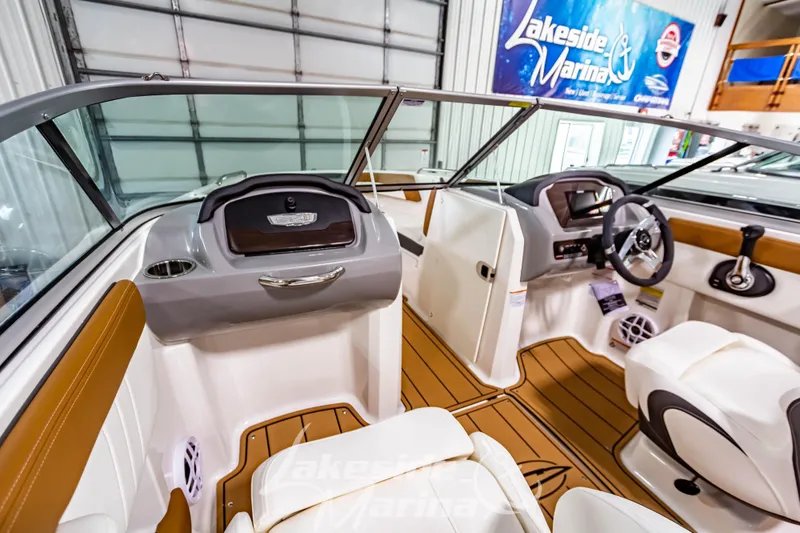 Slide: The Image of 2026 Chaparral 21 SSi boat interior with dual seats and modern dashboard. - 20