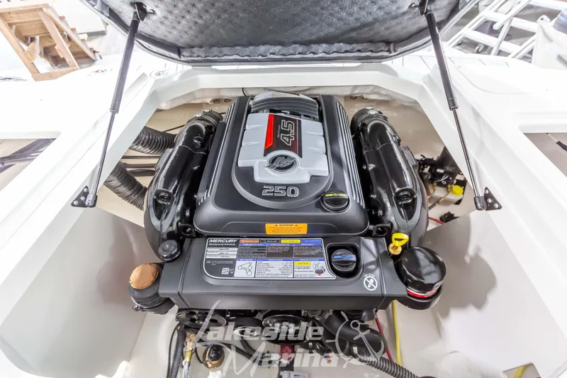 Slide: The Image of 2026 Chaparral 21 SSi boat engine compartment with Mercury 4.5L 250 horsepower engine. - 14
