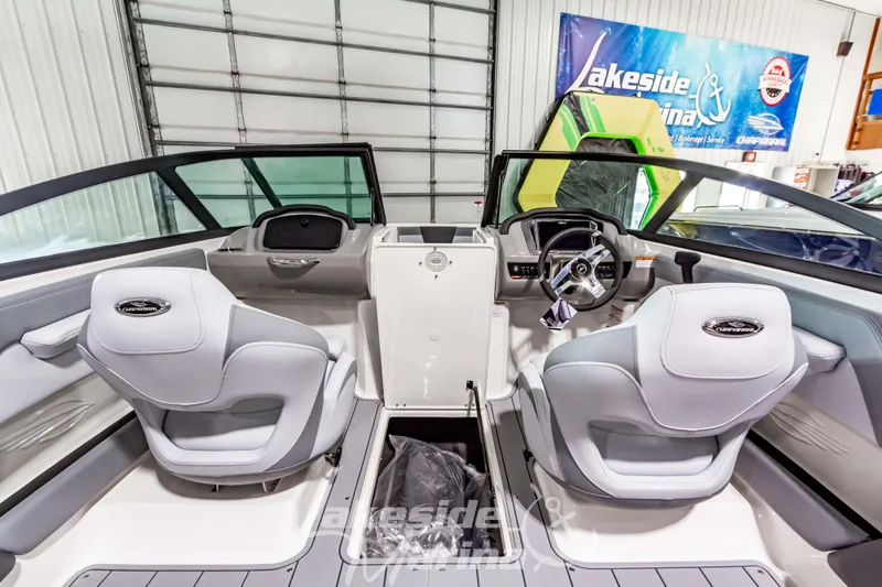 Slide: The Image of Interior view of 2026 Chaparral 21 SSi boat with modern seating and dashboard. - 17