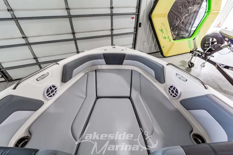 Slide: The Image of Interior of 2026 Chaparral 21 SSi boat with gray seating and speakers. - 26