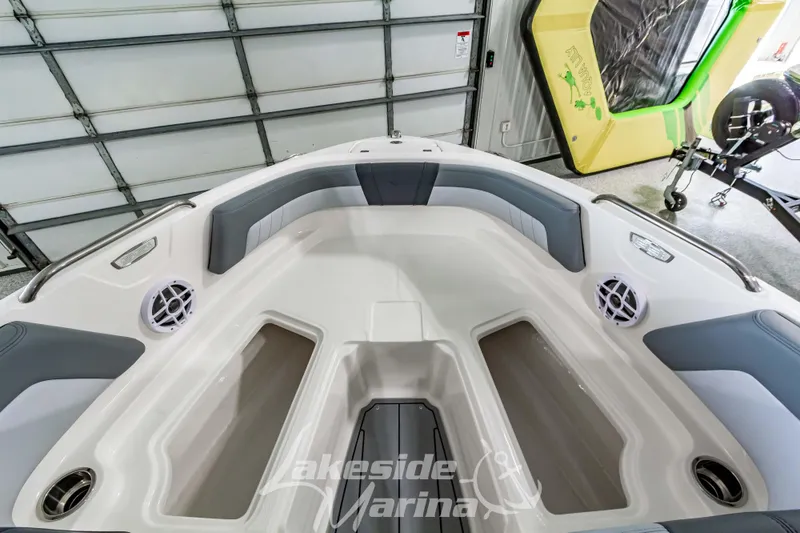 Slide: The Image of 2026 Chaparral 21 SSi boat interior with spacious seating and modern design. - 27
