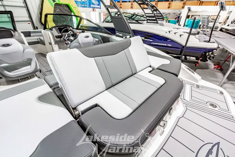 Slide: The Image of 2026 Chaparral 21 SSi boat interior with sleek seating at Lakeside Marina. - 9