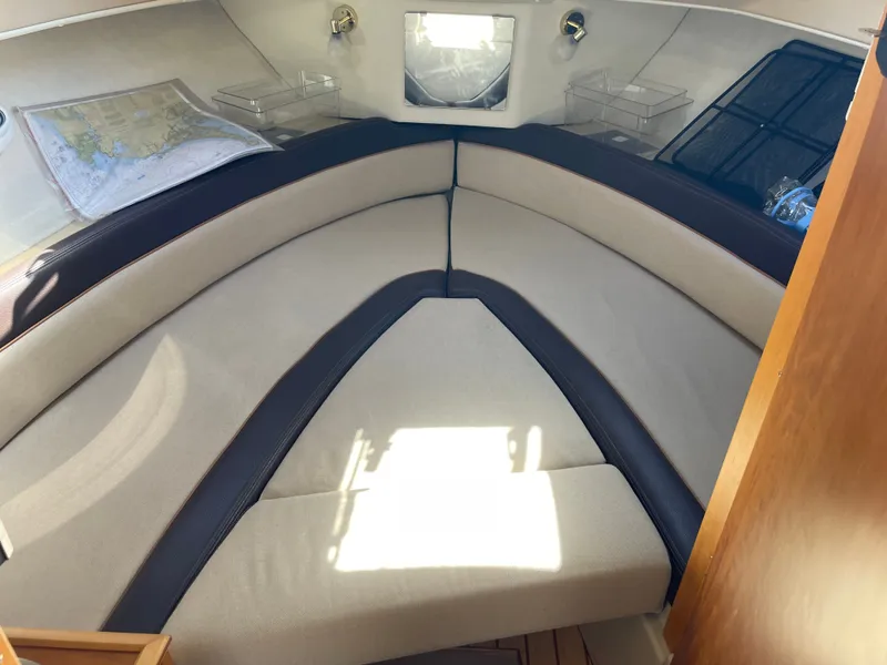 Slide: The Image of Interior of a 2017 Cutwater C-24 with beige upholstery. - 14