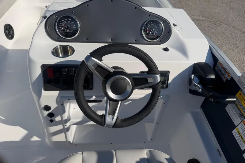 Slide: The Image of 2026 Hurricane FunDeck 198 RE OB boat interior with spacious seating and modern design. - 14