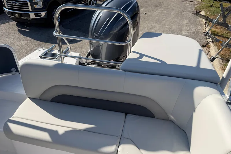 Slide: The Image of 2026 Hurricane FunDeck 198 RE OB boat interior with seating and control panel. - 6