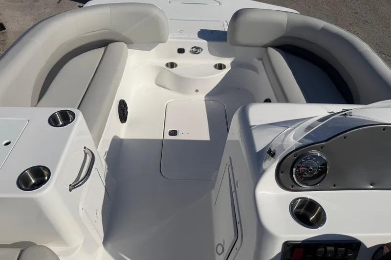 Slide: The Image of 2026 Hurricane FunDeck 198 RE OB boat interior with plush seating and modern design. - 8