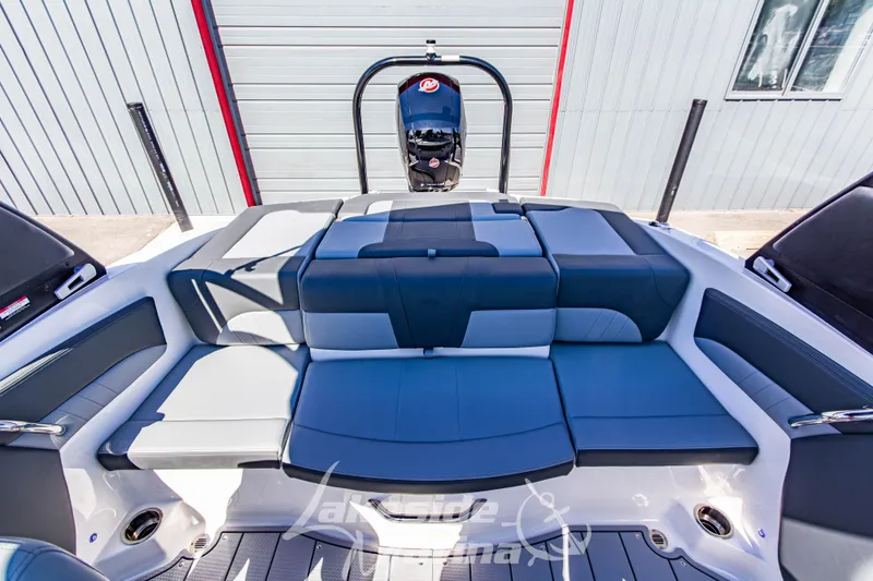 Slide: The Image of 2026 Chaparral 21 SSi OB boat interior with spacious seating and modern design. - 16